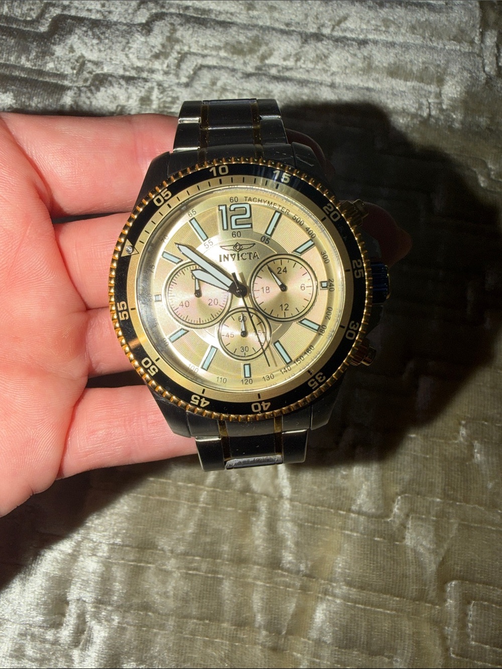 Invicta Gold Dial Chronograph with Black Bezel and Bracelet Accents